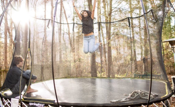 jumping on trampoline at home